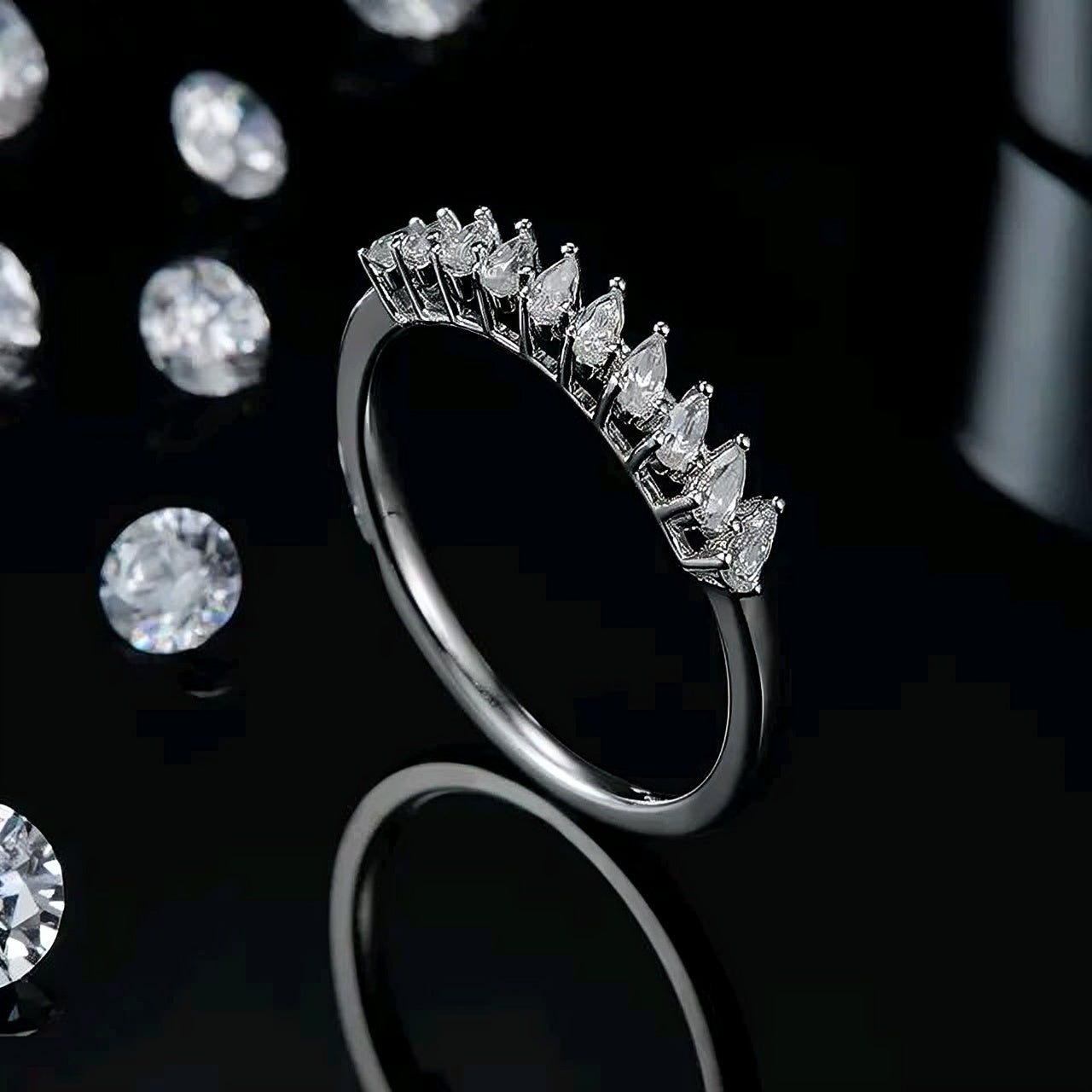 Pear cut multi Moissanite Ring