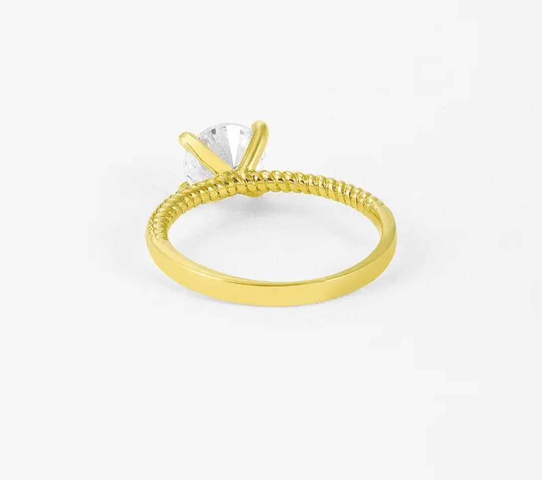10k gold ring with 7mm round moissanite