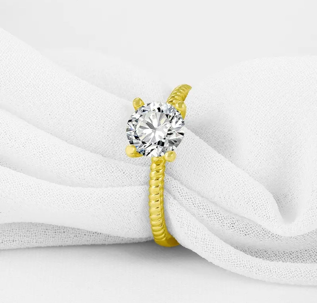 10k gold ring with 7mm round moissanite