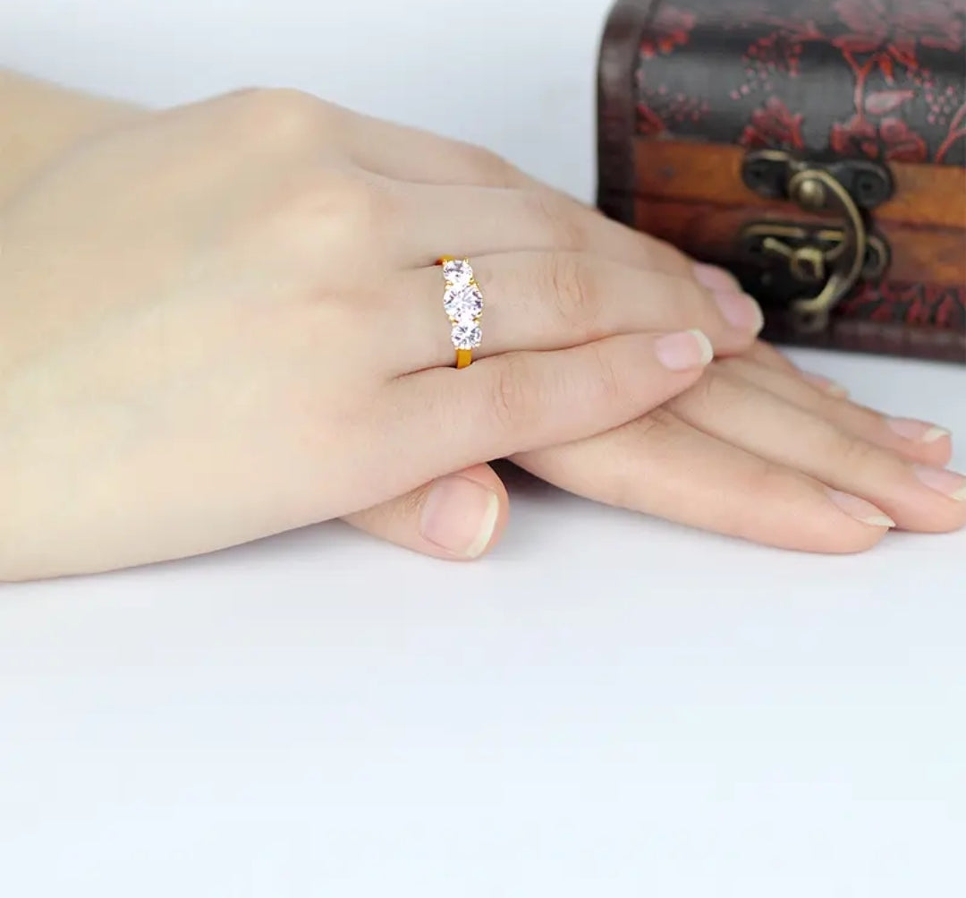 10k gold ring with 6.5mm round cut moissanite