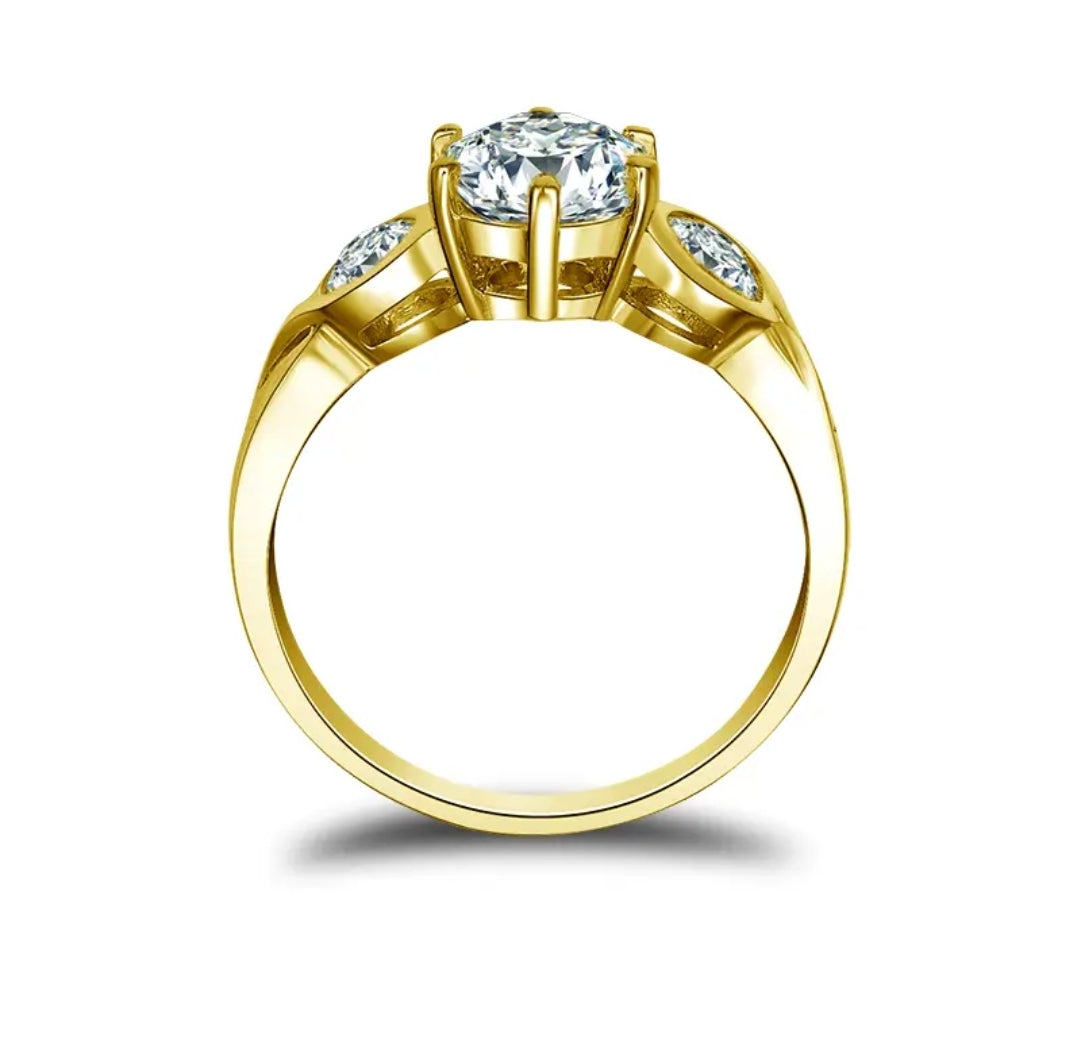 10k gold ring with 7mm 4mm 4mm brilliant moissanite