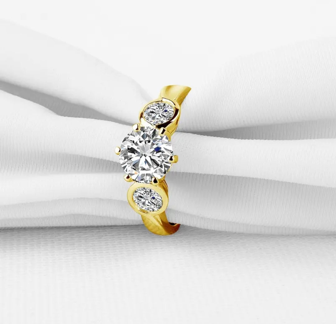 10k gold ring with 7mm 4mm 4mm brilliant moissanite