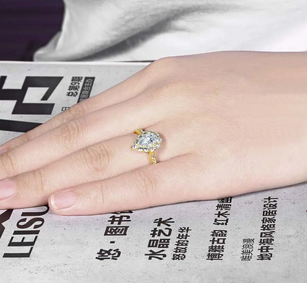 Solid gold 1.2ct pear cut moissanite ring