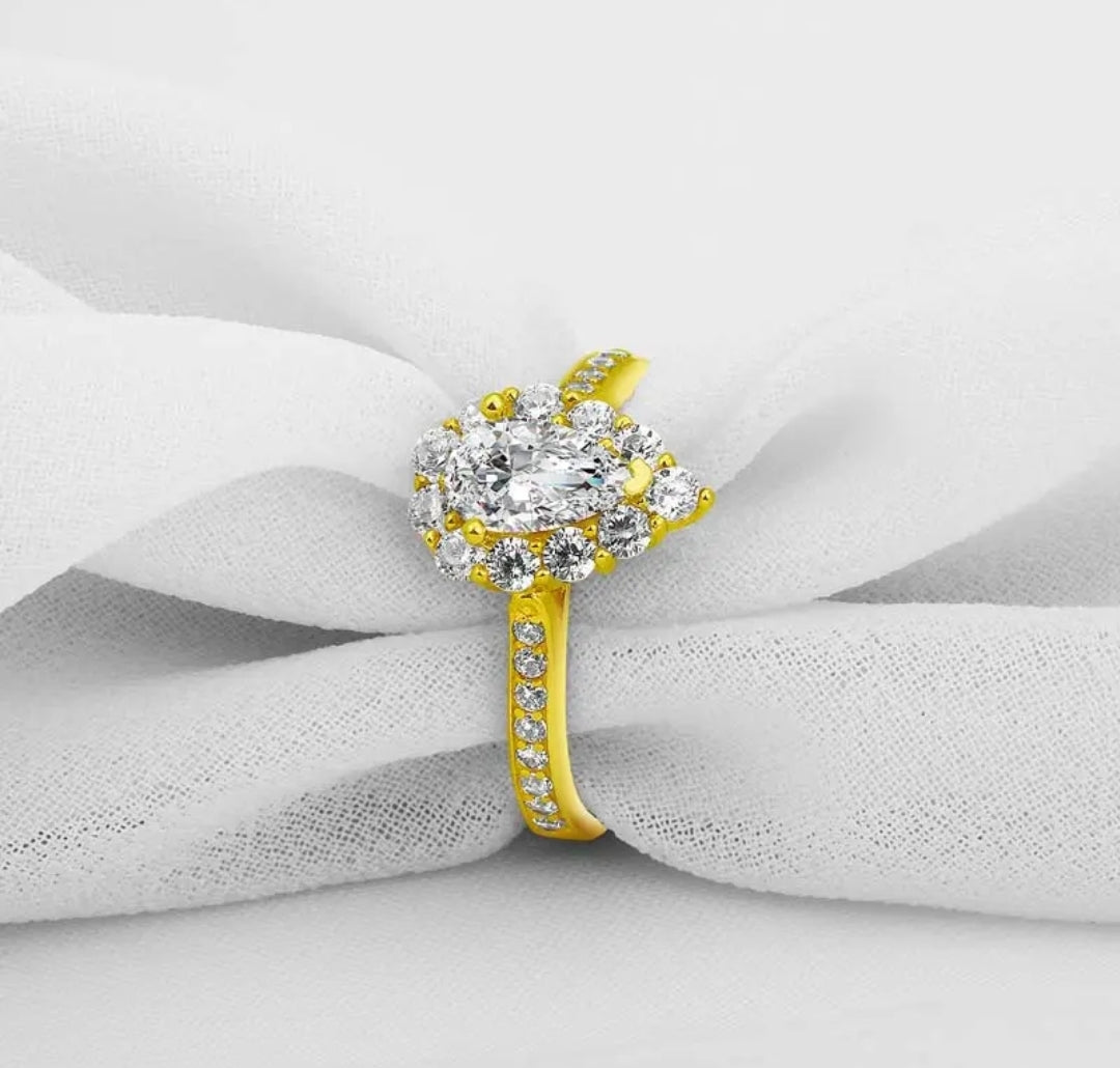 Solid gold 1.2ct pear cut moissanite ring