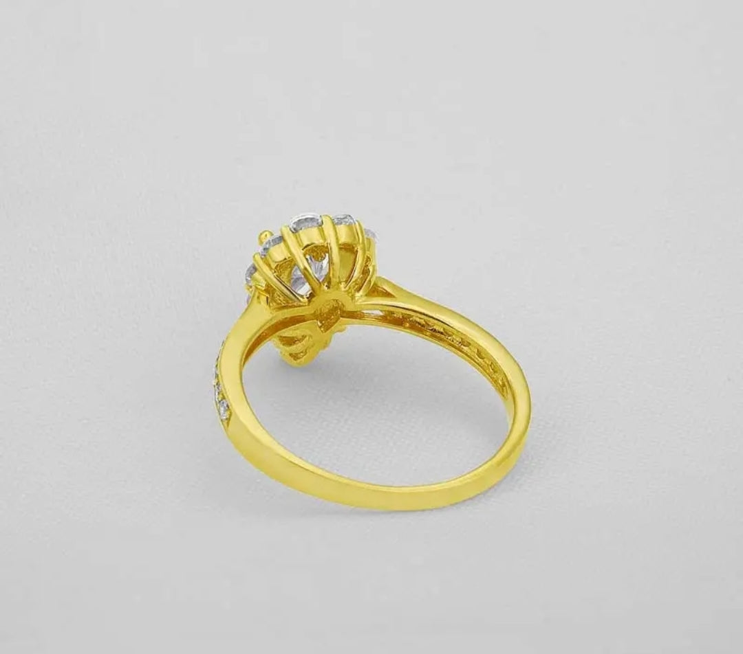 Solid gold 1.2ct pear cut moissanite ring