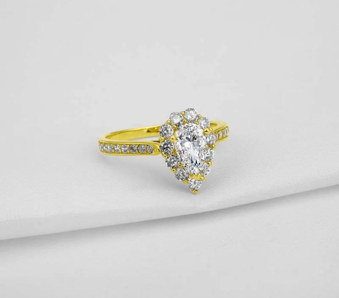 Solid gold 1.2ct pear cut moissanite ring