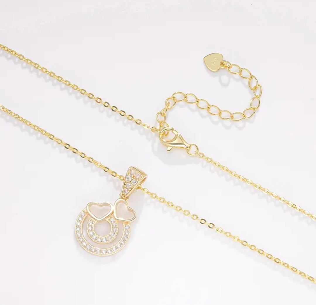 14k solid gold double heart necklace with 1.3mm zircons