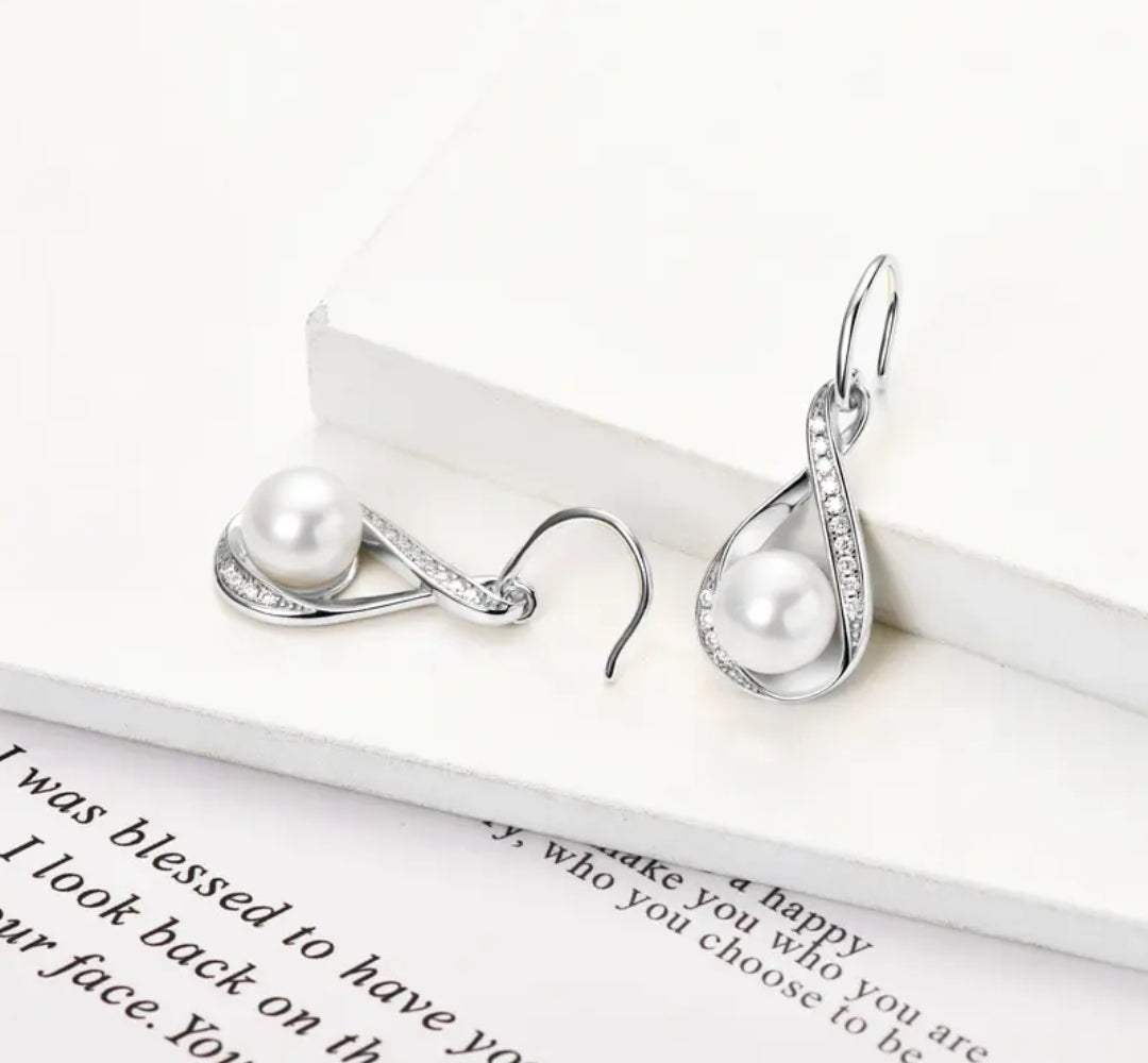 8mm pearl and 1.2mm multi moissanite earrings