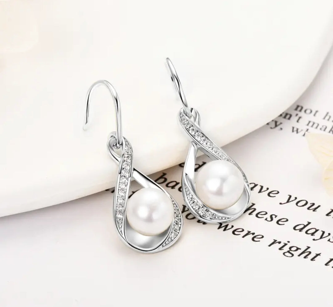 8mm pearl and 1.2mm multi moissanite earrings