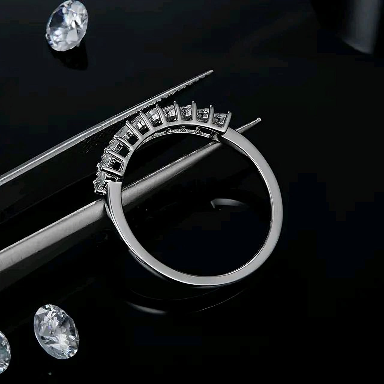 Pear cut multi Moissanite Ring