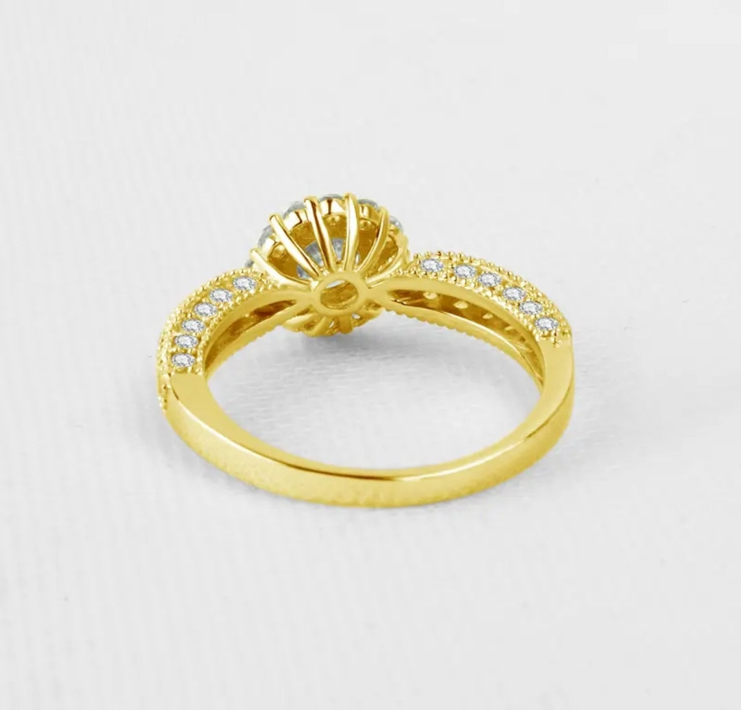 10k solid gold ring with 5.5mm sparkling moissanite