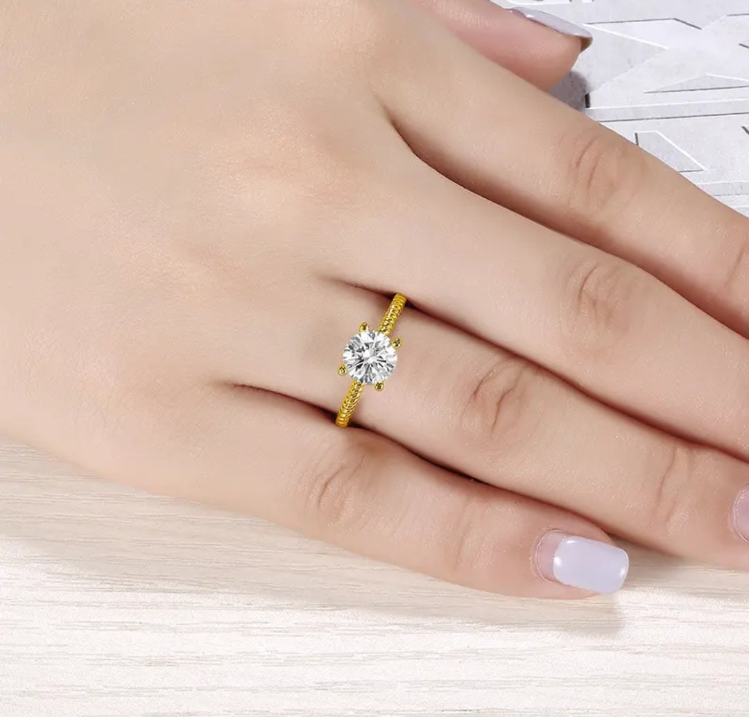 10k gold ring with 7mm round moissanite
